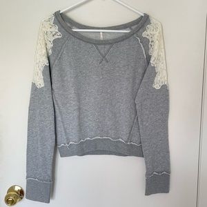 Free People long sleeve gray sweatshirt with lace detail. Size XS.